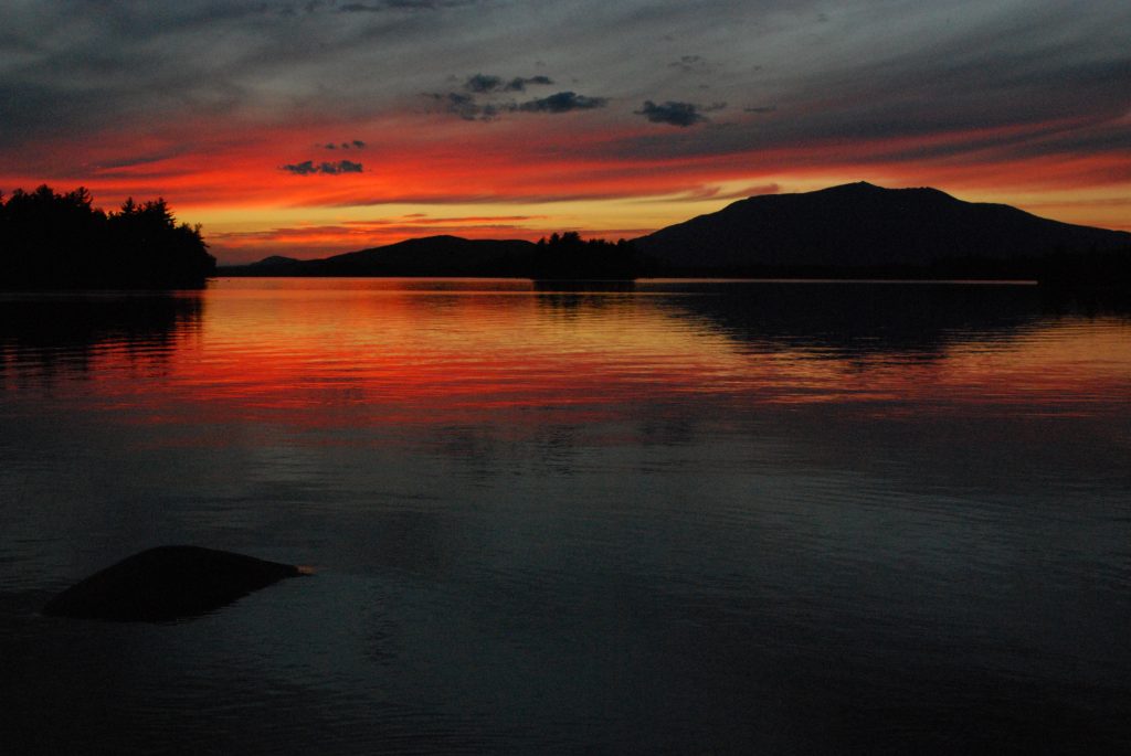 Canoe camping sunset