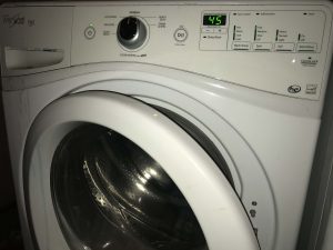 use a front loading washing machine before storing drysuits