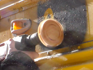 Using a rubber eraser wheel to remove school bus decals